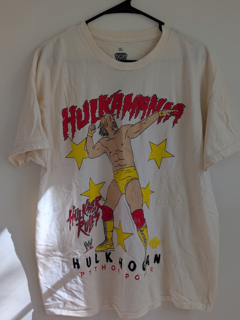 WWE Hulkamania Men’s Cream Tee with Red and Yellow Graphic